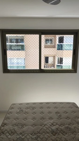 Imagem ilustrativa de Instalação de rede de proteção em janela