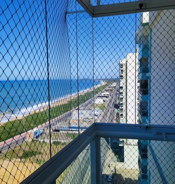 Instalação de rede de proteção em varanda